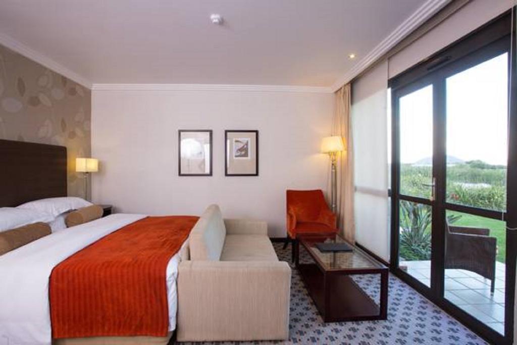 Phakalane Golf Estate Hotel Resort Габороне Номер фото